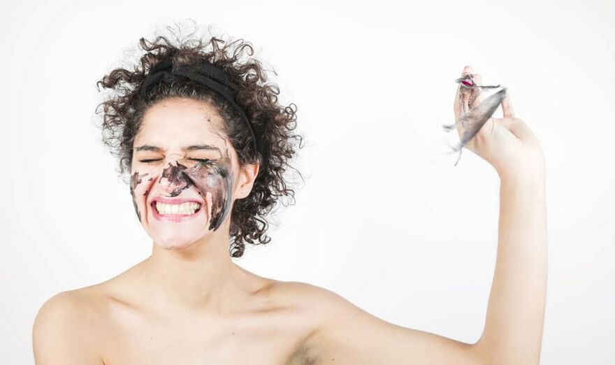 a woman performs a rejuvenating facial treatment